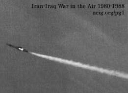 The second stage of an Iraqi SA-2 “telephone pole” passes harmlessly in front of an Iranian RF-4E, which captured this hair-raising moment. (Authors’ collection)